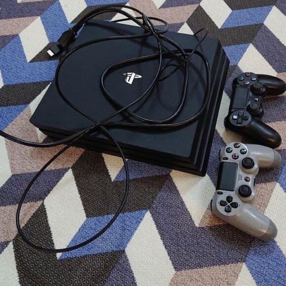 Sony PlayStation Pro(1TB) controllers games cords